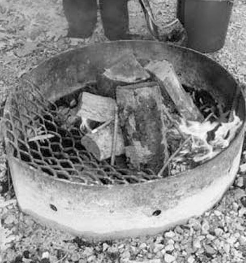 Campfire burning safely in ring